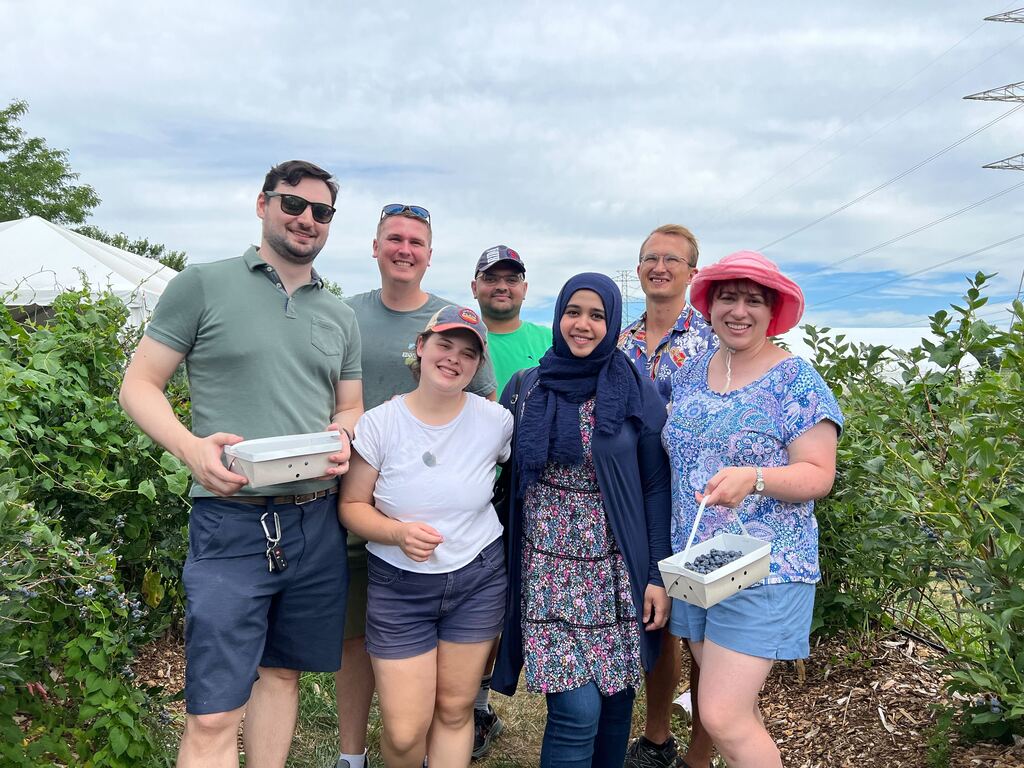 Members of the lab on a berry picking trip.